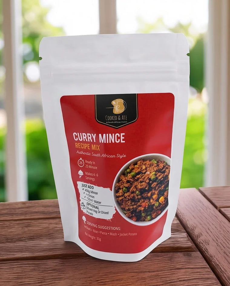 A photo of a Cooked & Ate Curry Mince Recipe Mix packet.